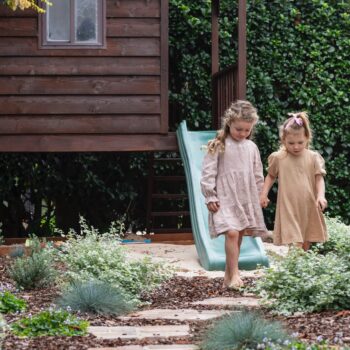 kids walking in their garden